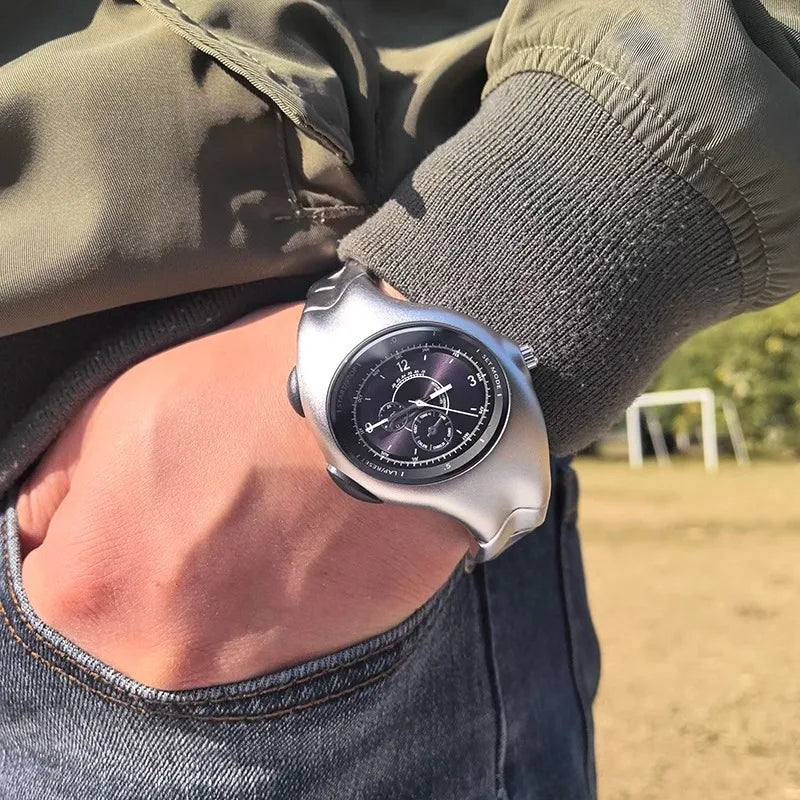 FORM TR!AX by CHRONOFORM — irregular sculpted alloy case with numberless dial and stainless steel bracelet