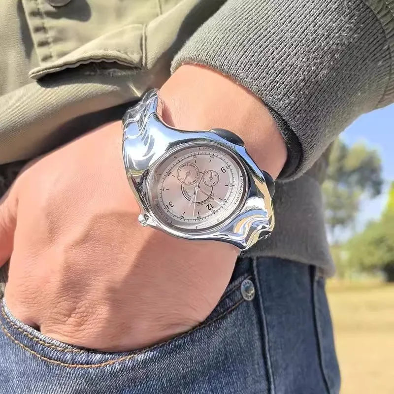 FORM TR!AX by CHRONOFORM — irregular sculpted alloy case with numberless dial and stainless steel bracelet